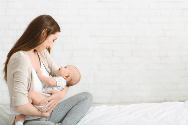 istock Young mother enjoying to spend time with her newborn son 1176757541
