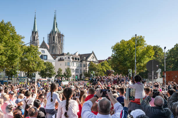 Munich, Germany - September 21, 2019: crowd of visitors watching the opening parade of the Oktoberfest 2019 in front of main entrance gate
