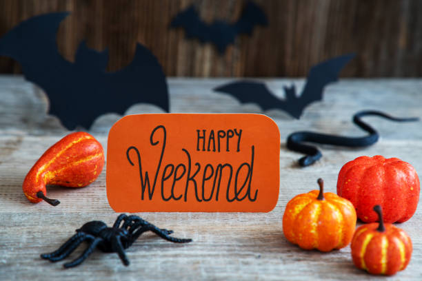 Orange Label, Calligraphy Happy Weekend, Scary Halloween Decoration stock photo