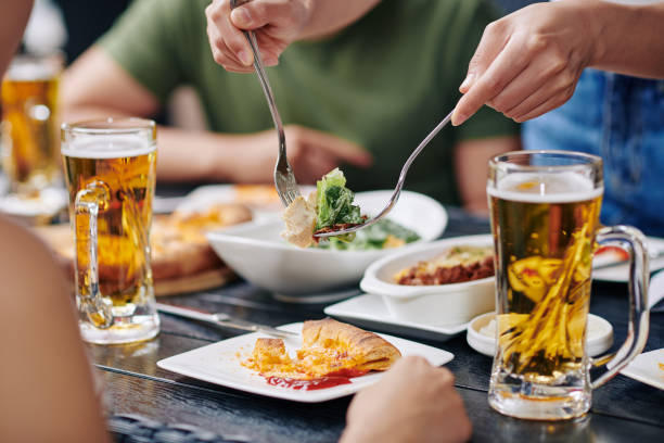istock People eating food at the table 1176758048