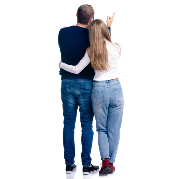 istock Young couple woman and man showing pointing looking 1176758801