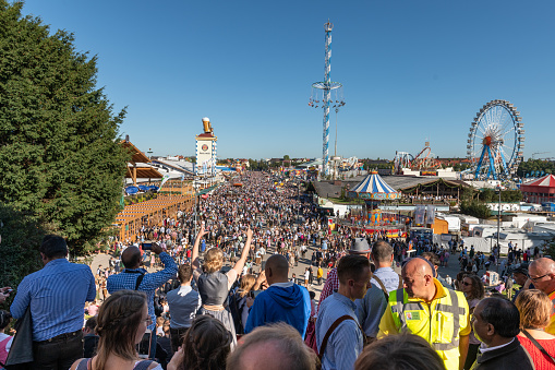 Munich , Germany - September 21, 2019: elevated view on the crowd of people on the Wiesn at Oktoberfest in Munich at opening day