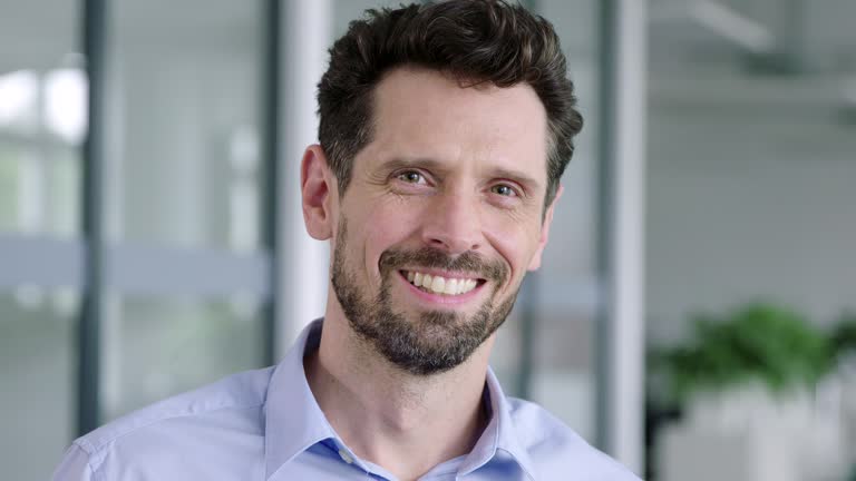 Portrait of a smiling mature businessman in office