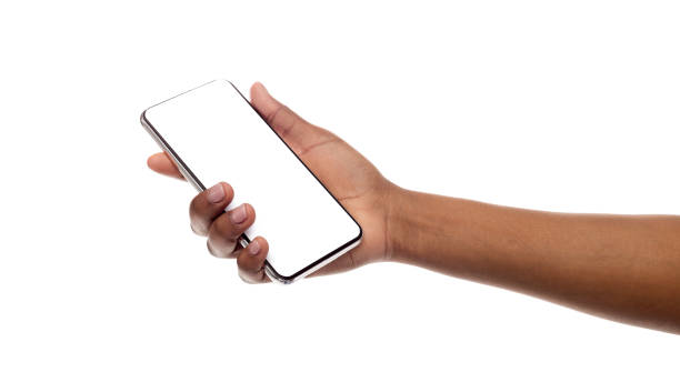 istock Black woman's hand holding mobile phone with blank screen 1176760498