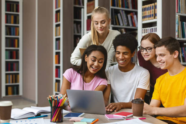 istock Group of college students checking on new project 1176760745