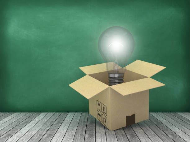istock Cardboard Box with Light Bulb on Wood Floor - Chalkboard Background - 3D Rendering 1176763921