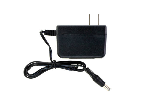 Image of Black Electric power adapter isolated on white background. Computer hardware. stock photo