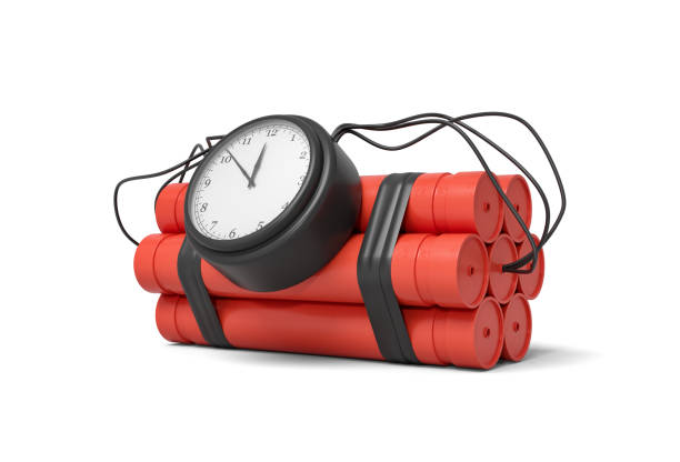 istock 3d rendering of a bundle of dynamite sticks with a clock attached to the side of it on a white background. 1176772619