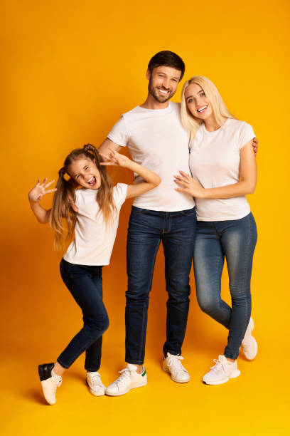 istock Cheerful Family Posing Having Fun In Studio, Full Length 1176772700