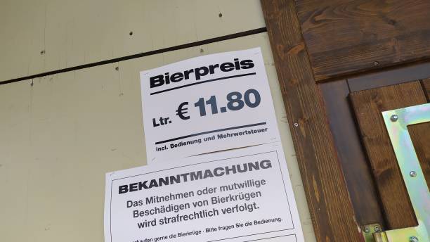 price of a beer in german language in oktoberfest 2019 in theresienwiese area, munich, germany - oktoberfest beer munich german culture imagens e fotografias de stock