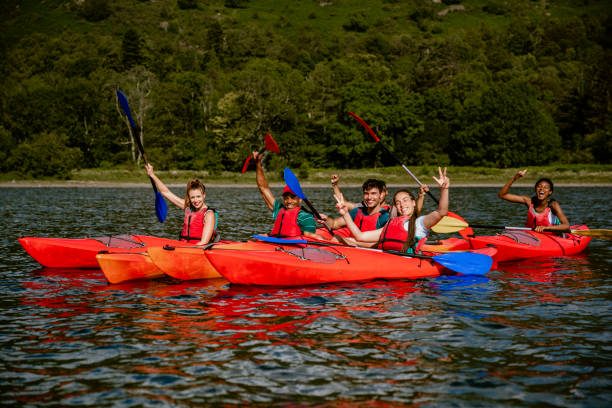 istock Group of Friends Having Fun in Kayaks 1176774038