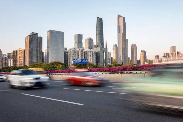 istock A highway passes by the skyscraper in the business center. 1176774399