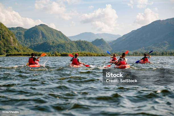 Friends Learning To Kayak Stock Photo - Download Image Now - Kayaking, Kayak, Group Of People
