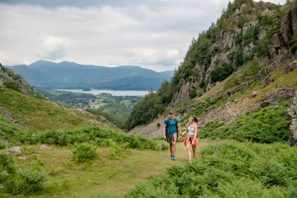 Photo of Young Couple out Walking in the Countryside