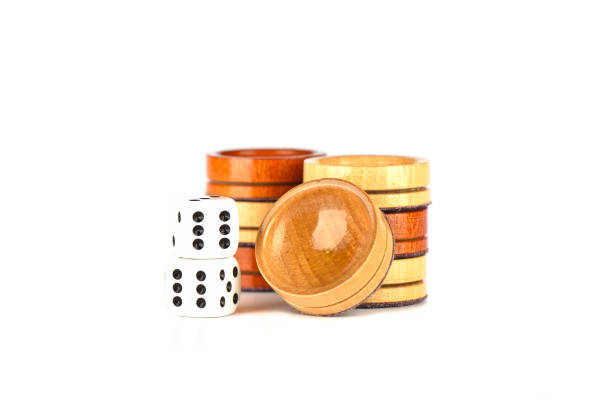 istock Dice and backgammon checkers isolated on a white background. 1176782293