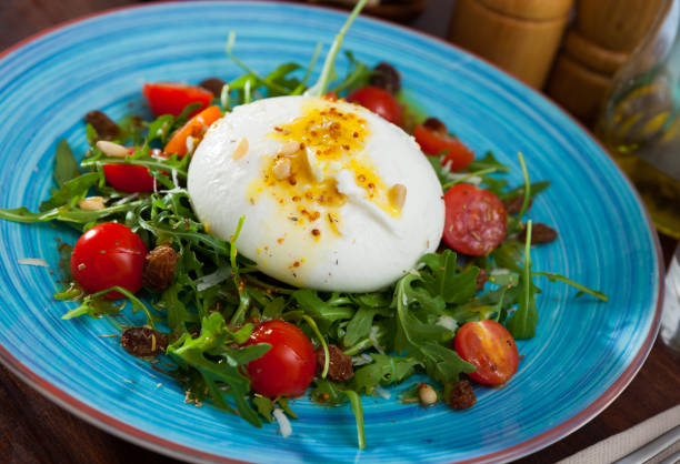 istock Burrata cheese salad 1176782610
