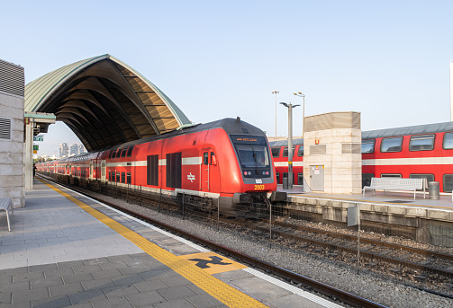 Tel Aviv-Yafo, Israel, September 17, 2019 : A train arrives at Tel Aviv University Station on the Israeli Railway in Tel Aviv