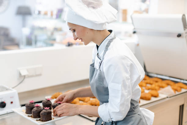 istock Patissier working on little chocolate desserts 1176782812