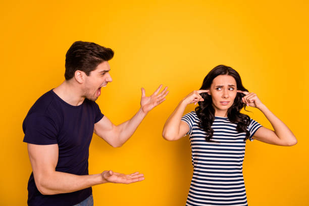 istock Portrait of nice attractive depressed devastated gloomy grumpy aggressive married spouses having argument disagreement pretense failure crisis period isolated on bright vivid shine yellow background 1176787767