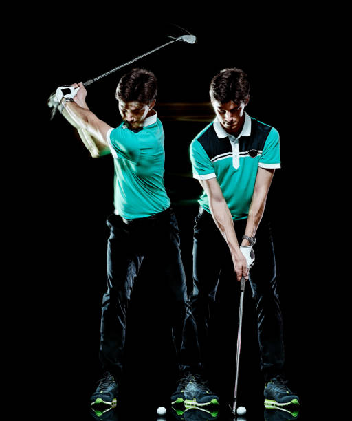 istock Golfer man golfing golf swing isolated black background multiple exposure 1176792086