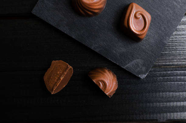istock chocolate candies in the different forms and taste 1176797123