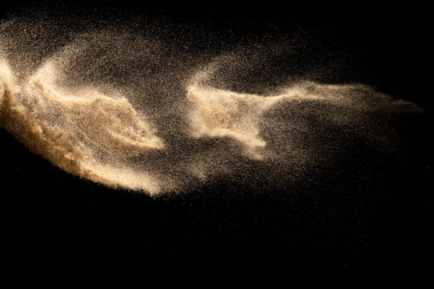 istock Dry river sand explosion isolated on black background. Abstract sand cloud.Brown colored sand splash against dark background. 1176797900