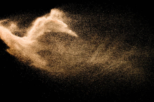 istock Dry river sand explosion isolated on black background. Abstract sand cloud.Brown colored sand splash against dark background. 1176797926