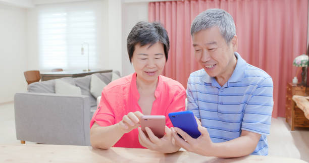 istock asian eldely couple use smartphone 1176800013
