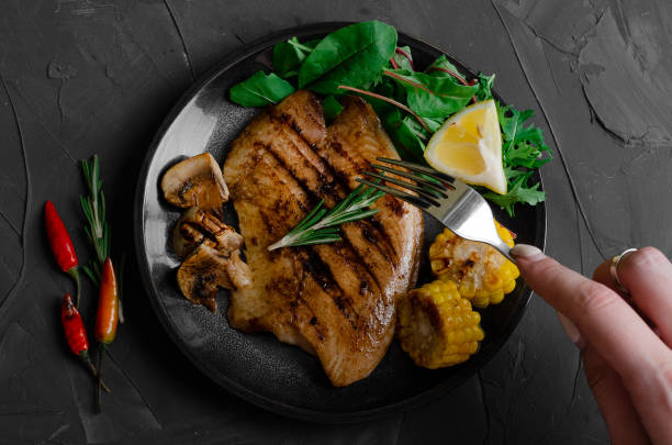 istock Grilled Fish Fillet with BBQ Vegetables and herbal 1176802350