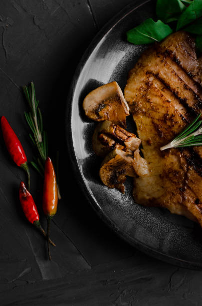 istock Grilled Fish Fillet with BBQ Vegetables and herbal 1176802366