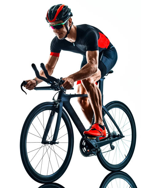istock triathlete triathlon Cyclist cycling silhouette isolated white background 1176806224