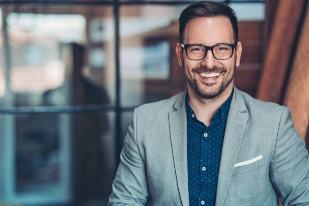 istock Portrait of a smiling businessman 1176806510