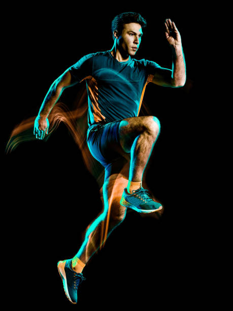 istock runner running jogger jogging man isolated light painting black background 1176806625