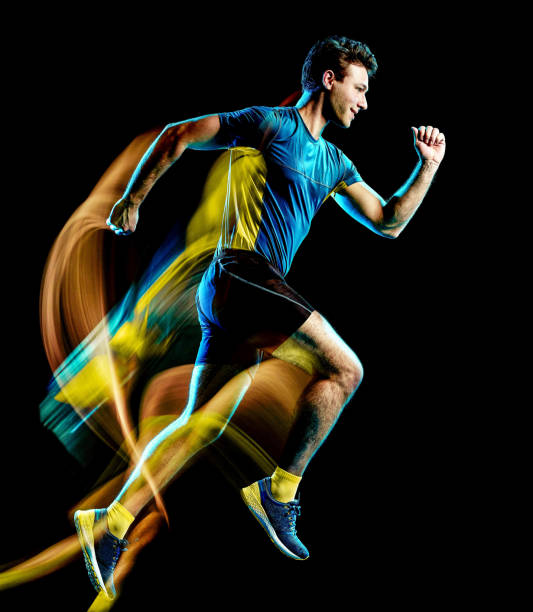 istock runner running jogger jogging man isolated light painting black background 1176806642