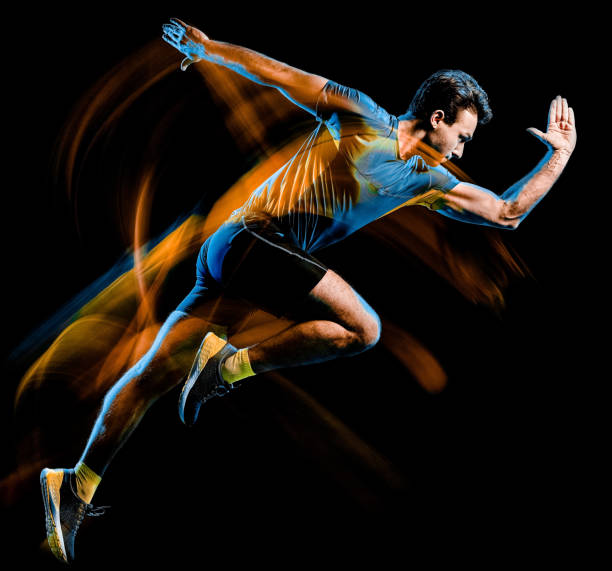 runner running jogger jogging man isolated light painting black background one caucasian runner running jogger jogging man light painting speed effect  isolated on black background sportsman professional sport side view horizontal stock pictures, royalty-free photos & images
