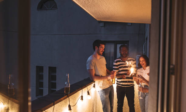istock Happy People Holding Sparklers 1176808313