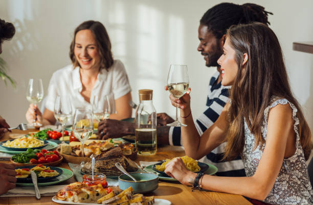 istock Friends Enjoying Dinner Party 1176808568