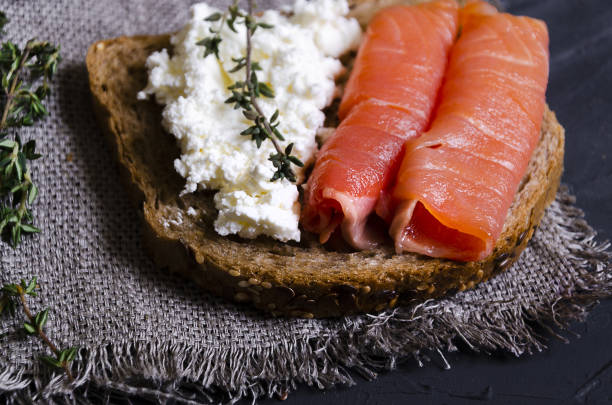 istock sandwiches with various fillings: ham, cheese, avocado, sauce 1176808921