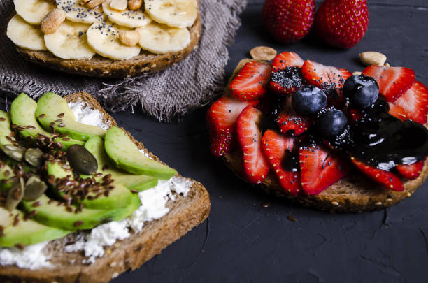 istock sandwiches with various fillings: ham, cheese, avocado, sauce 1176808964