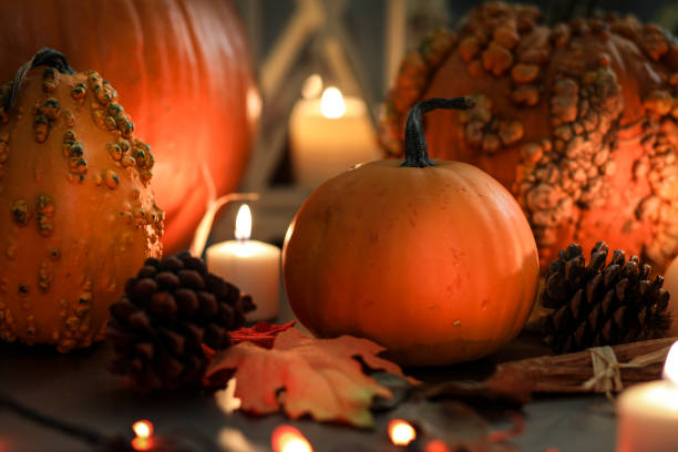 istock Halloween, autumn scene with pumpkins and candles. 1176808981