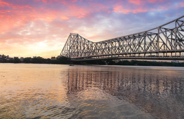 istock Historic Howrah bridge on river Ganges at Kolkata at twilight with moody sky 1176811766