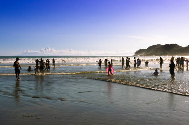 People playing at the seaside in Japan stock photo