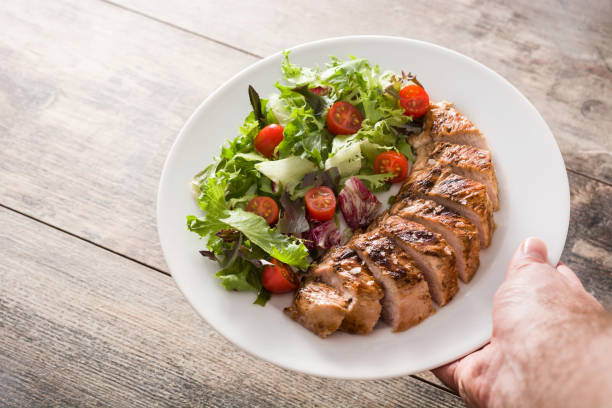 istock Grilled chicken breast with vegetables 1176815131