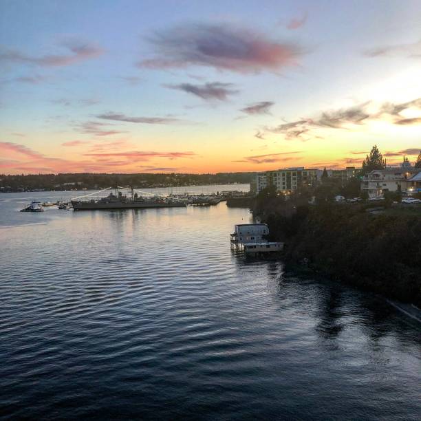 istock Sunrise over peninsula and water 1176815386