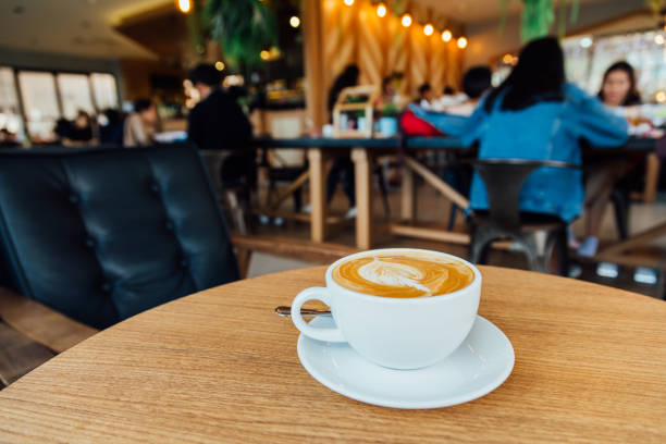 istock Top view of Latte or cappuccino coffee tree leaf texture 1176815409