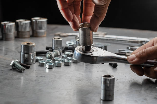 istock Close up automotive mechanic picking tools in garage 1176815871