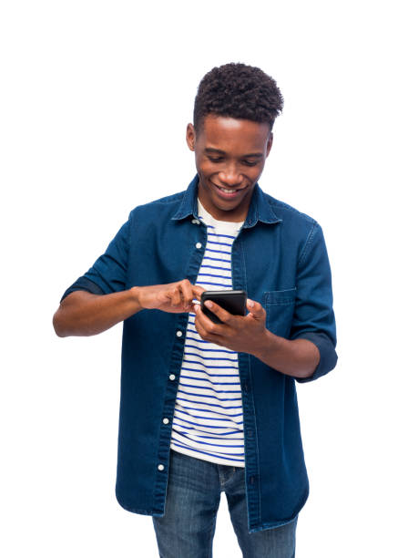 istock Afro-Caribbean male using a smartphone 1176817349