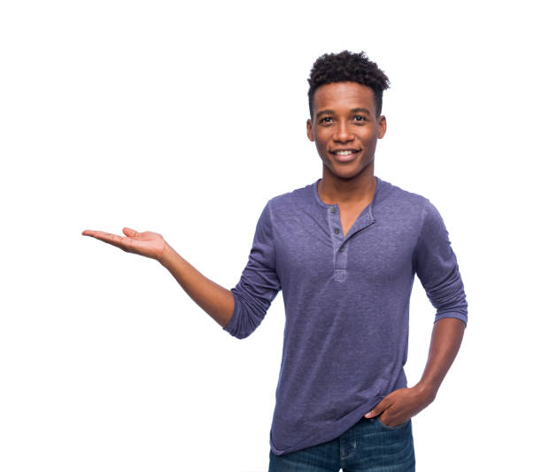 istock Smiling young man holding something for copy space 1176817382