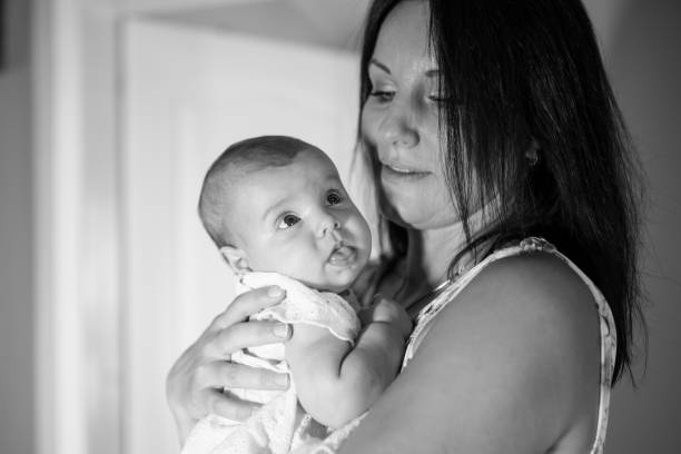 istock Mother holds newborn baby 1176818247
