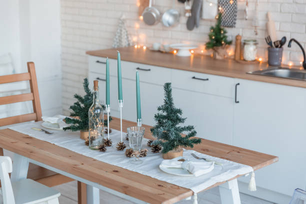 Interior light kitchen with christmas decor and tree stock photo